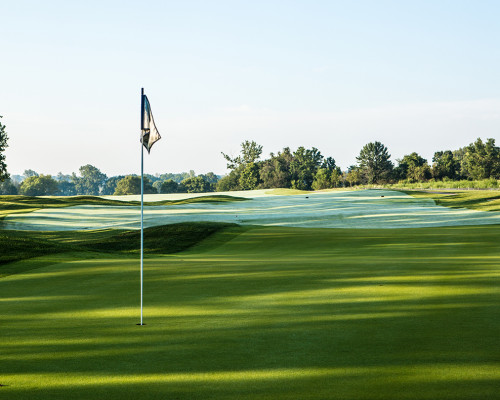 The Club at Chatham Hills with green and hills