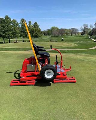 Golf course equipment for rolling.